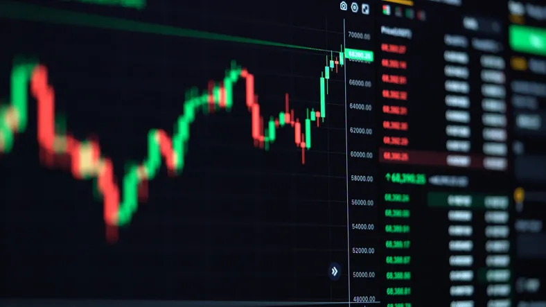 Green and red candlesticks and an order book on a dark financial trading screen.